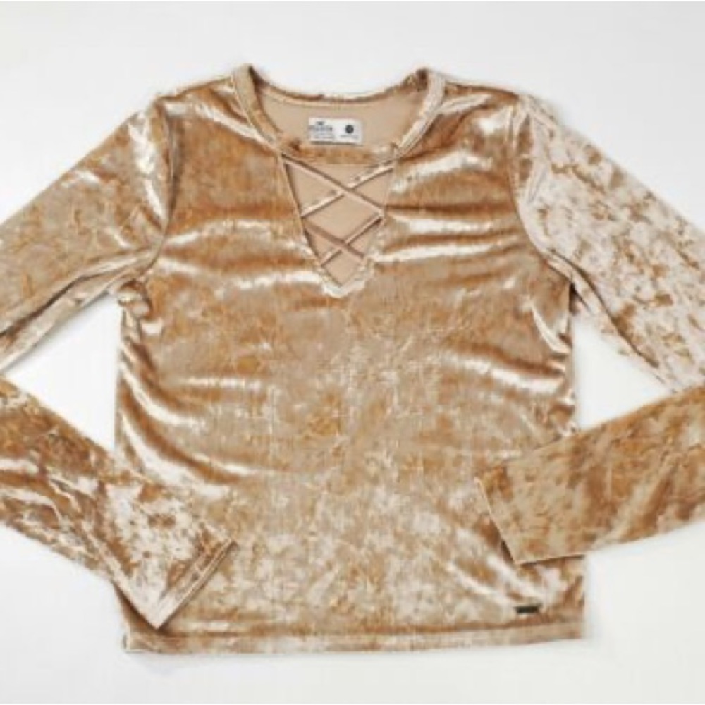Champagne/gold colored crushed velvet top with cross front. Size S hollister